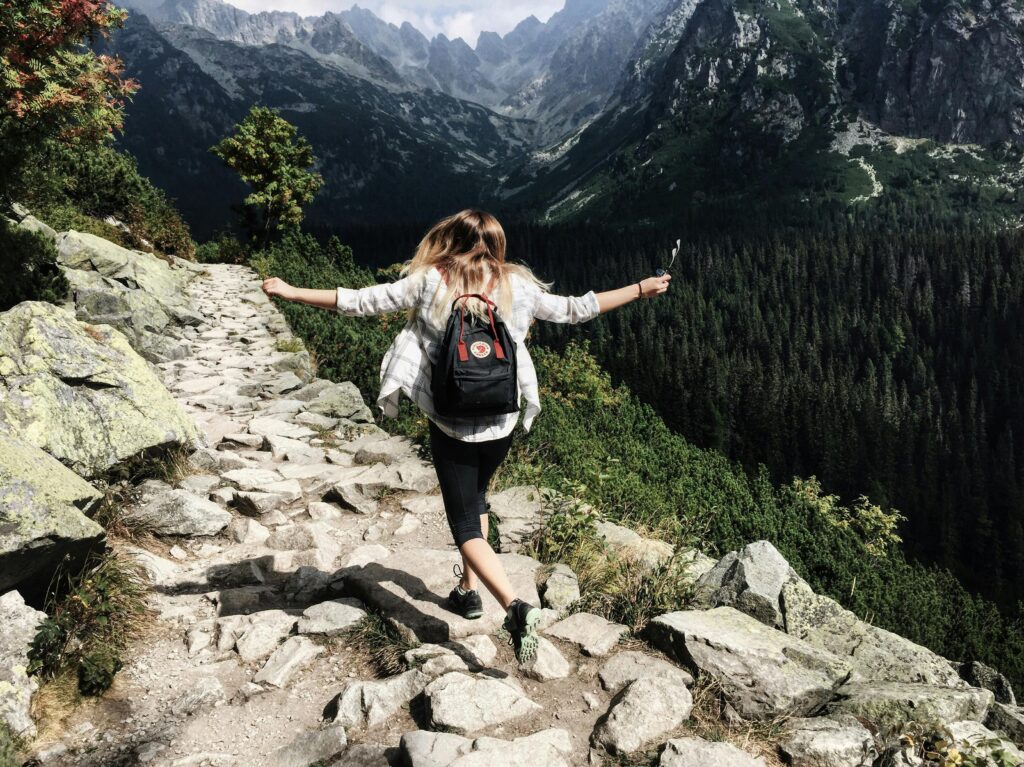 pexels-photo-287240-287240 Woman hikes along rocky path in Vysoké Tatry, Slovakia. Embracing nature and freedom.