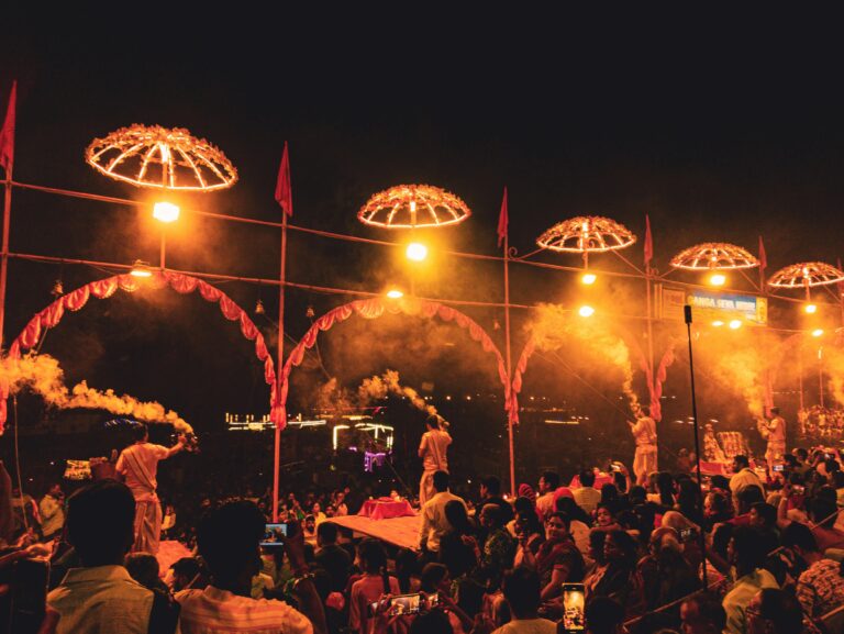 A mesmerizing evening aarti ceremony by the Ganges River in Varanasi, India, showcasing vibrant cultural traditions.