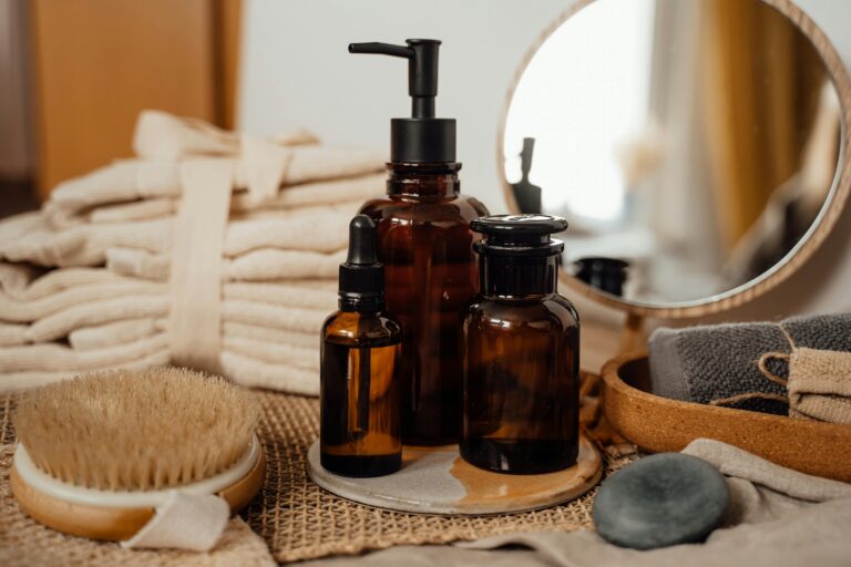 A sophisticated arrangement of toiletry bottles, towels, and decor in a bathroom setting, perfect for modern home aesthetics.